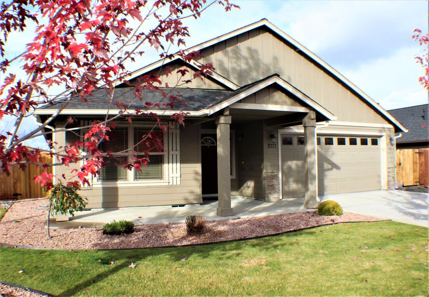 Exceptionally well cared for home on short 
cul-de-sac in close proximity to medical, shopping & schools. Dunlap Home builders ''Juniper'' plan in desired NW Redmond w/over-sized 2 car garage. Open floor plan w/spacious kitchen, bar seating, huge great room w/gas fireplace. Kitchen features large island/bar & pantry. Shaker style Knotty Alder cabinets w/crown molding & Quartz slab counters. Stainless steel appliances, gas range. Wood laminate flooring throughout living space. Large Master Suite w/ massive walk-in closet, dual sinks & over-sized walk-in shower. High efficiency gas furnace and A/C thru heat pump.  Cascade Mtn views fro Master, living & back yard. Covered front porch and back patio. Move-in ready.