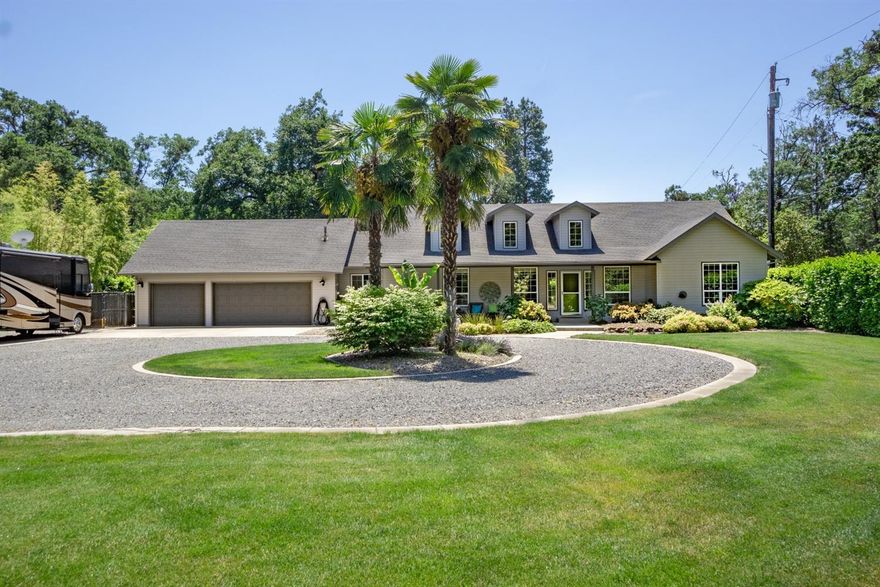 Rare opportunity to own a .73 acre private oasis w/ city services! Fully fenced and gated w/ a circular driveway gives security & easy access in/out. Entering this custom built, lovingly maintained home you will be greeted by splashes of color & extensive windows/sliders that draw you to the park-like backyard. Open concept living features slate floors, vaulted ceilings spacious kitchen w/ dble ovens, gas stove, breakfast bar, walk-in pantry & wet bar. Great room has built-in entertainment center & gas frpl. Master bdrm en-suite features his/hers walk-in closets, dual sink vanity, whirlpool tub & oversized shower. The spacious laundry rm w/ bath is sure to delight! The ultra -private manicured backyard is an entertainer's dream w/ gas heated 18 X 40 Pebble Tec sports pool w/ slide, expansive patio & cabana. The 3-car garage & RV area includes 30 amp and sewer hook-ups and gives you room to park all your toys. Bonus 27 X 10 space above garage & so much more makes this a must see!