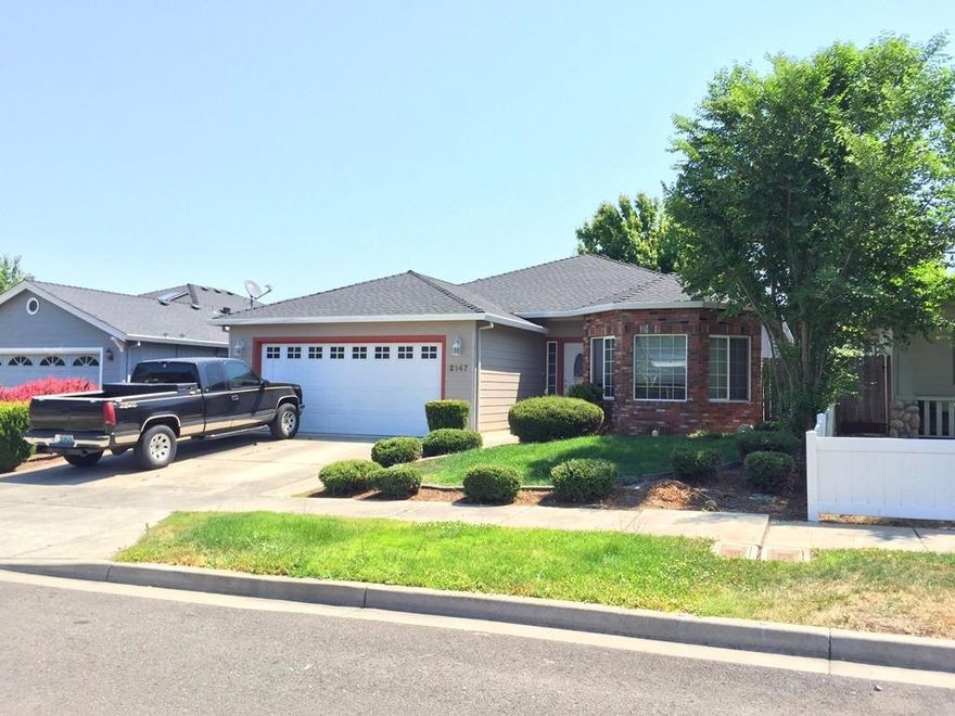 You will love this nice, well cared for home that is located in a beautiful Medford neighborhood. It features 3 bedrooms, 2 baths, hardwood floors and newer carpet. The spacious living room has a slider to the backyard, the dining room has a pretty bay window, and the large kitchen has lots of cabinets for storage and plenty of counter space. The master bedroom is good sized and has a walk in closet. The backyard is easy care and there is a covered patio that is a wonderful spot for an afternoon of relaxing. There is a 2 car garage with attic storage that has pull down ladder access.