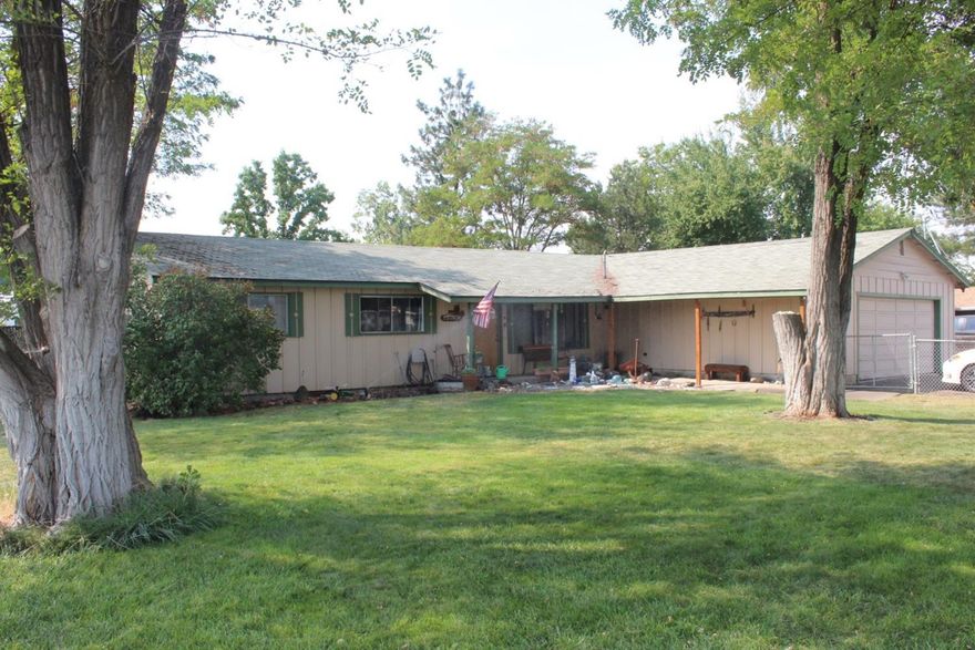 This property is located in the heart of the Rogue Valley among the orchards! With views of the valley and the surrounding hills, this could be the perfect place to create your dream home! The home itself will need some repairs and updating, including foundation and HVAC, but there's no better spot to be close to all the valley has to offer, and still have your privacy and room to relax. The shop / RV barn was built in 2004 and is set up nicely for RV storage or as a work shop. The garden is productive and the back deck and yard are private and shady. There's a small pasture and orchard for your animals or your extended garden.
This is a cash sale.