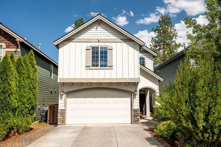 Welcome to 61342 Huckleberry Place—tucked in one of Southwest Bend's most sought-after neighborhoods and surrounded by peaceful green space. This warm and inviting 3-bed, 2.5-bath home backs to a park and Pine Ridge Elementary. Ideally located just three blocks from the Deschutes River Trail and steps from 'The Pit,' a beloved neighborhood gathering spot for year-round fun and winter sledding. Inside, enjoy a clean, bright open-concept layout with a cozy fireplace in the living room and flexible bonus space upstairs. Storage includes a generous pantry and walk-in closets in all bedrooms, including a spacious one in the primary suite. Savor serene views of mature trees from the bedroom and soaking tub. Out back, your private backyard oasis awaits—fully fenced with lush landscaping, multiple seating areas, paver patios, and direct gate access to the park. As part of River Canyon estates, enjoy the pool, fitness center and tennis courts. New roof in June 2025--come check it out!