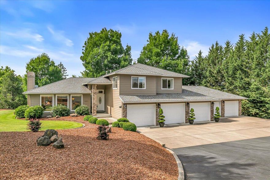 Looking for a 6 Car Attached Garage and Huge Shop?!!!  Whether you're a Car Enthusiast, running your business from Home, or a Hobbyist, this property has it all!  Garage is complete with an office, roll-up door, and pass-through convenience, plus a huge 32' x 44' Insulated Shop with Heat & A/C, toilet and sink.   35' RV Carport with Hookups, the possibilities are endless!  This meticulously cared for 3 bed, 2 1/2 bath home offers both elegance and functionality. Inside, the home boasts formal and informal living areas with vaulted ceilings, cozy gas fireplace and large windows offering mountain views! The updated kitchen features beautiful Granite Counters and SS Appliances, while Oak flooring and Berber carpet add warmth and charm.  Enjoy the convenience of Central Vac, a dual zone HVAC, and 2 covered patios with high-end screens and awnings for ultimate comfort.   Situated on a .93 lot with mature landscaping, you will enjoy a serene, rural feel while minutes away from it all