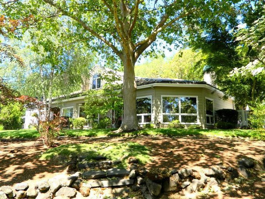 Executive home on 2.5 acres in school District #7. Home has great curb appeal with paved driveway white vinyl fencing, professional landscaping and calming water feature. Custom home boast of 3116 sqft with add'l 680 sqft guest quarters. Main house is 3 bdrm 3 bathrooms. Updated kitchen with granite counters, center island, refinished cabinets, tile floor and oversized pantry. Sunken living room with fireplace and soaring ceilings. Formal dining, wet bar & cozy family room. Master suite on the upper level w/ separate sitting room and walk in closets. Master bathroom with double sinks, shower and soaking tub. Entertain your family and guest with the spa and solar heated in ground pool with automatic cover, private fenced backyard with covered outdoor kitchen. 4 car garage. Guest quarters with loft bedroom and bath, living room and kitchen area.