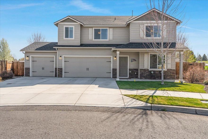 Looking for a home that offers space, style and versatility? This beautifully maintained  two-level home has it all! 4 spacious bedrooms upstairs and a flexible office/studio on the main floor, you'll have plenty of options to accommodate your needs. Downstairs, an inviting great room features a gas fireplace, and flows into the open dining area and kitchen. Kitchen and baths were just updated with quartz countertops and full tile backsplash. All bedrooms are upstairs which includes a ,guest bath, laundry room, and primary suite and ensuite bath with separate soaking tub and shower. Outside, the private backyard has mature trees and shrubs to provide natural screening while the covered patio offers a perfect setting to relax or entertain. Storage is no issue, with the generous three-car garage and 3 additional storage sheds, one of which has power and doubles a s a workshop - ideal for creative projects.