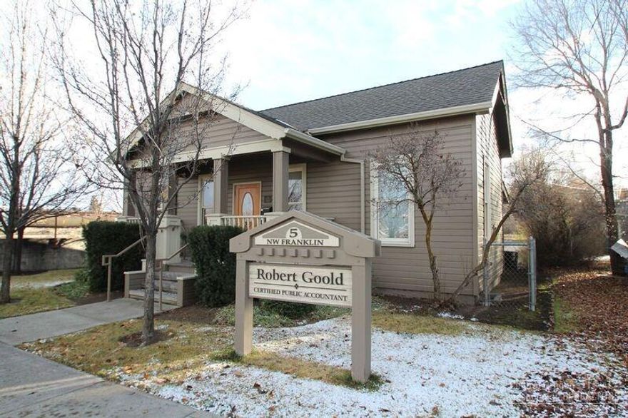 Completely renovated historic office building near downtown. Two private offices, open central work space, small reception, kitchen and ADA restroom with shower. Perfect for an owner user. Tons of architectural character and historical significance. 1,072 square feet of first floor office and 924 square feet of basement/storage (per Deschutes County tax records)