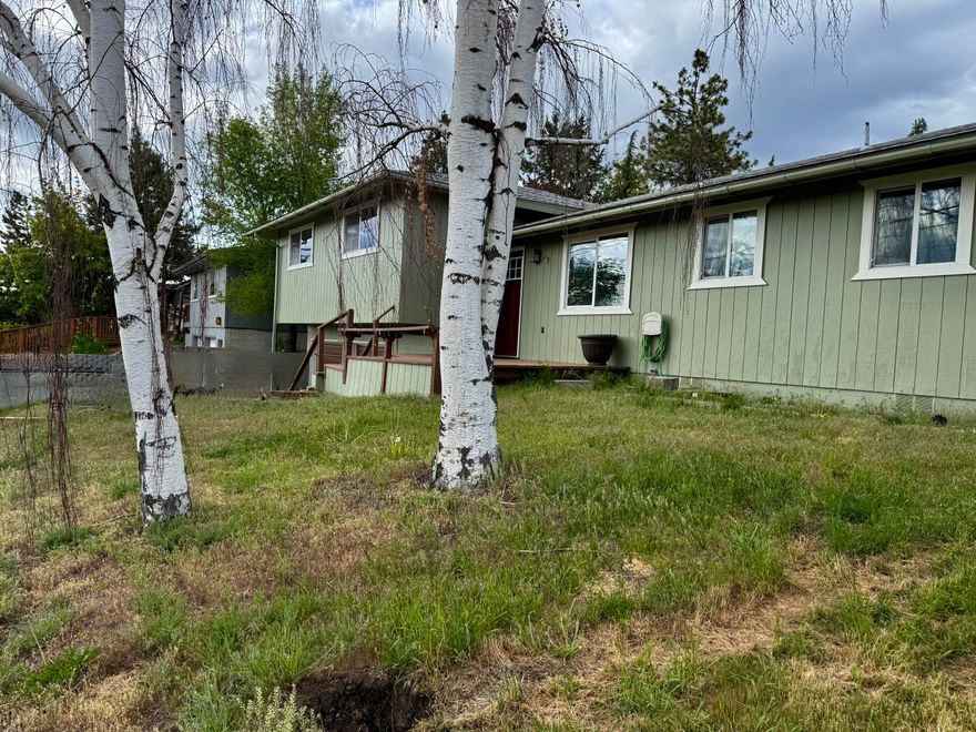 Spacious 4-Bedroom Home Near OIT - Move-In Ready! Just minutes from OIT, this generously sized 4 bedroom, 2.5 bath home offers comfort, convenience, and room to grow. Step onto the welcoming front deck and into a bright, open layout. The expansive galley kitchen features ample counter space, a built-in desk, pantry, and breakfast bar.  The kitchen is perfect for cooking and gathering. The large living room opens to a huge back deck through sliding doors, ideal for entertaining or relaxing outdoors. The primary suite is filled with natural morning light thanks to its North and East-facing windows, and includes a private ensuite bath. The attached two car garage is oversized, offering extra room for a workshop or storage. Enjoy peace of mind with fresh exterior paint, recently upgraded air conditioning and gas furnace, and more thoughtful updates throughout. Whether you're looking for a spacious family home or a quality OIT rental investment, this one checks all the boxes!