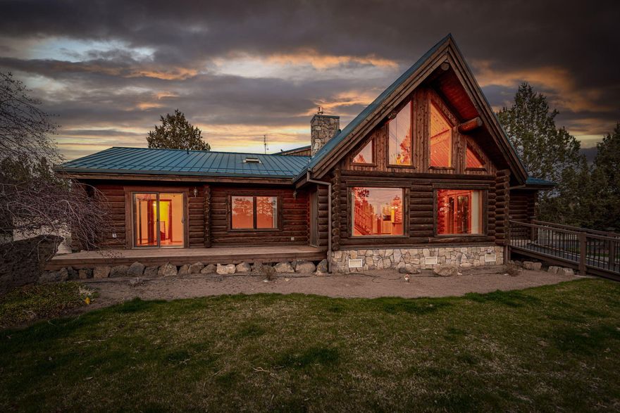 Welcome to this stunning property that captures the essence of the old wild West. Bordering public lands with breathtaking views of the Cascades, this property is perfect for equine enthusiasts, hobby farmers, off-road motorists, or anyone seeking privacy and natural beauty. The centerpiece of this property is a beautiful log home that exudes rustic charm and warmth. Inside, a cozy living space with stone fireplace, spacious kitchen with modern amenities & a primary suite with stunning views. A dream-come-true shop for any DIY'er includes guest quarters, epoxy floors & dedicated woodworking area. Don't forget the barn - a horse lover's paradise with stalls, small indoor arena, grooming & tack areas, plus an RV / storage bay. This is a rare opportunity to own a piece of the quiet rural life with all the modern amenities you could want. Start living the dream of country living with beautiful views & endless possibilities. (Loft or shop quest qtrs can be 3rd bedrm with closet addition.)