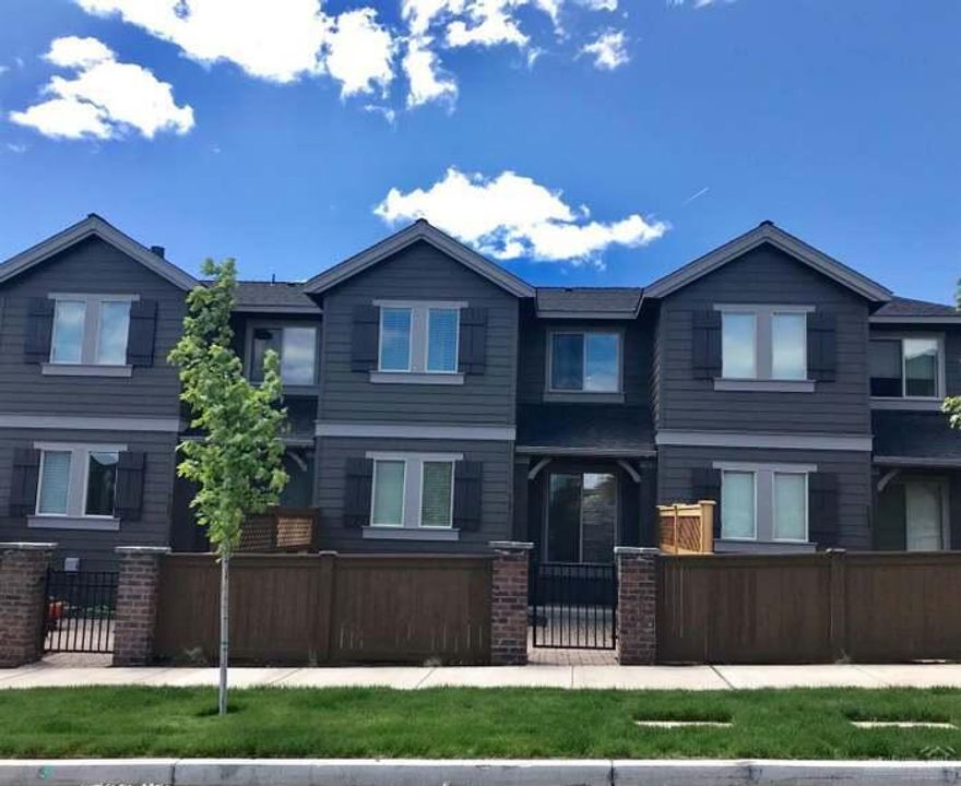 Welcome to your Bend retreat! This beautiful 3-bedroom 2-bath townhouse offers 1,450 sqft of comfortable living in on of Bend's most desirable neighborhoods. With a bright open floor plan and modern finishes throughout, this home is perfect for those who want the convenience of low-maintenance living without sacrificing style or space. The main level features a spacious great room with vaulted ceilings, a cozy gas fireplace, and large windows that fill the space with natural light. The kitchen is equipped with stainless steel appliances, ample cabinet storage, and a breakfast bar- perfect for entertaining or casual dining. Upstairs, you'll find a generous primary suite with a walk-in closet and private bath, plus two additional bedrooms ideal for guests, family, or a home office. Enjoy sunny Central Oregon days from your private patio or take advantage of nearby trails, parks, and all the amenities Bend has to offer. With an attached garage, modern updates and a location close to scho