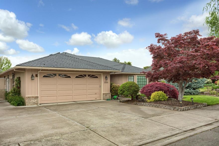 East Medford home 1 owner on a cul-de-sac. 3 bedrooms and all have walk in closets. Large guest bath double vanity, sky light, master suite. Family room with fireplace, formal living room, eat in kitchen and formal dining, indoor laundry with a sky light, beautiful landscaping water feature, raised beds, work shop with room for another car heated and air conditioned. Deck in back to enjoy the lovely tranquil creek (water feature). RV parking tops off this property with water, sewer and electrical hook ups!!!