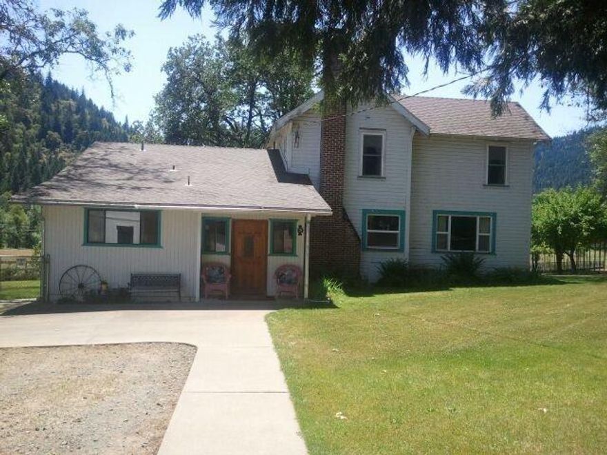 Beautiful level, pastured ranch with two deeded water rights from W. Evans Crk. This two story farmhouse is surrounded by nature and trees the 2314 sq ft home has 2 bed 2 ba with a guest house w/1bed 1 ba. This farm home was remodeled with two heat pumps,wood floors, kitchen and baths. 65+ acres with 42'X30 4 stall garage, covered RV Parking, 3 wells, separate unfinished ranch hand house 80'X110' loafing barn, woodshop, block, barn,carport,fenced garden, pasture completely fenced in. 1915/1919 water rights rights on 60 acrs. 2 wheel lines+laterals. Motivated seller Make Offer!