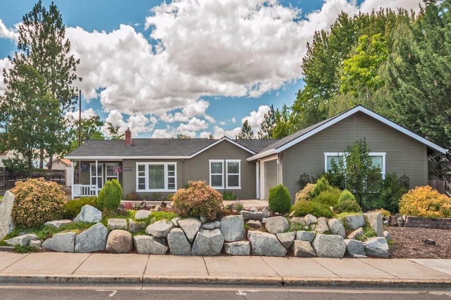 Check this out if you are looking for a family style home in town with almost a half an acre.. 3 bed 2 full baths plus an office.. single story 1886. The living room features a electric fireplace, ceiling fan, large windows with a view of Roxy Ann. Charming kitchen with hints of days gone by. Updated appliances included. Sliding glass door leads to a private patio area perfect for afternoon BBQ's. This private area is beautifully landscaped with timed sprinklers. Cozy dining room with a barn door leads to the inside laundry room. The office is also off the dining room.. Could be a 4th bed (just add closet). The master suite is a newer addition and is truly a suite. Large vaulted ceilings with fan, soaking tub with TV, tiled shower, double sink vanity. An exit out to a patio with hot tub outlets. 2 other bedrooms with ceiling fans and new carpet and a full bath between them. Newly constructed 2 car garage with additional 2 car shop in the back. Garden shed, RV parking and other lawn are