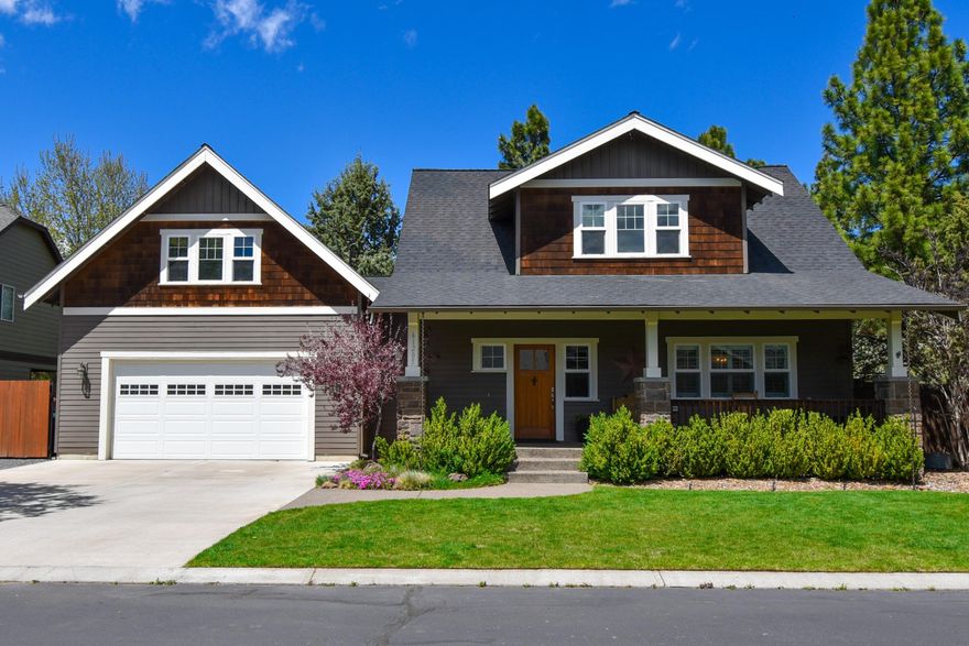 Well maintained 2814 SF home in the highly desired Ridgewater neighborhood. Main level boasts beautiful walnut hardwood floors, crown moldings & classic wainscoting. A fireside room w/a see through indoor/outdoor fireplace, sprawling windows w/high end custom finishes & heated tile floor (cozy on cool nights). Formal dining room & kitchen w/breakfast nook booth, SS appliances & granite counters. 2nd floor offers 3 bedrooms & 3 full baths. 2 master suites! One offers double vanity, oversize soaking tub & double closets (his & hers). The other master has vaulted ceilings, built-ins & spacious entry. Large bonus/rec room includes a wet bar. Private backyard is a park like setting w/a variety of mature trees, a cottage-like gardening shed & RV parking. A spacious paver stone patio, covered built-in BBQ/kitchen & a fireplace w/grand hearth makes the tasteful exterior  perfect for your entertaining needs. Outdoor living is complete with large front porch, neighborhood park & canal trails.