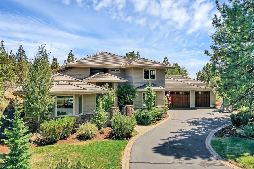 Beautiful and spacious, this lovely home backs up to 40 acres of open space on Overturf Butte. Offering privacy on a large lot in a great neighborhood, this inviting home has an open living concept with a gourmet kitchen, including double oven and Wolf cook top. Large master bedroom on the main floor, with 2 guest bedrooms plus a loft. Great entertaining house with wet bar in the family room, large salt water hot tub installed in 2018. Oversized 3 car garage provides ample storage.