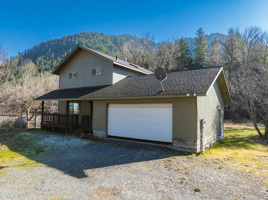 Acreage & Serene Surroundings: Escape to your own piece of paradise! This 3-bedroom, 2-bath home is nestled on a generous 8.49-acre lot. Lower level boasts a large open floor plan with a great room, dining, kitchen with granite countertops and easy glide cabinetry, and a bathroom. Upper level has three bedrooms and a large bath.  Hardwood floors and solid wood doors throughout the home. Not far from town and close to I-5 on/off ramps. With water rights, possibilities on your open pasture are endless. Garden, hike your creek, and manage tall timber; a nature lover's dream. Whatever your pleasure, this property has it all. This home is move-in ready, awaiting its new owners to make it their own.