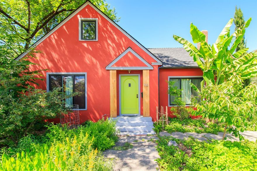 Well cared for single level home with lots of charm. It's freshly painted and has the original hardwood floors. Stainless appliances and new vinyl flooring in the kitchen. Adjacent dining room and wood burning fireplace in the living room. Lots of original built-in's and storage throughout plus an over size attic. There are many upgrades newer roof, interior and exterior paint, windows and ductless heat pumps. The yard is an urban oasis and truly special. It's a Certified Wildlife Habitat with chicken coop, edibles and flowers on an automated drip and sprinkler system. A true surprise right in town.