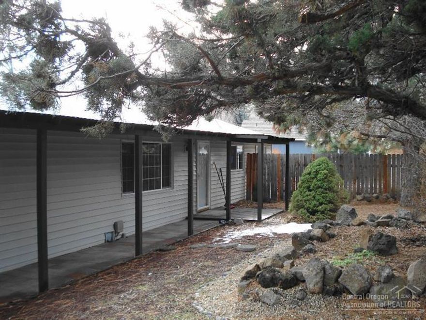 Single level frame built home in quiet established neighborhood. Hickory cabinets, slate counter tops with tile backsplash, stainless steel gas range and dishwasher, solid wood doors/trim throughout & newer carpeting. The master suite features tile floor & shower. Oversized 2 car garage w/brand new garage door & opener w/space to add work bench/shelving. All set on a fully fenced .35 acre lot offering privacy, paver patio, fire pit & RV parking with plenty of room left to add your garden, chicken coop, etc.