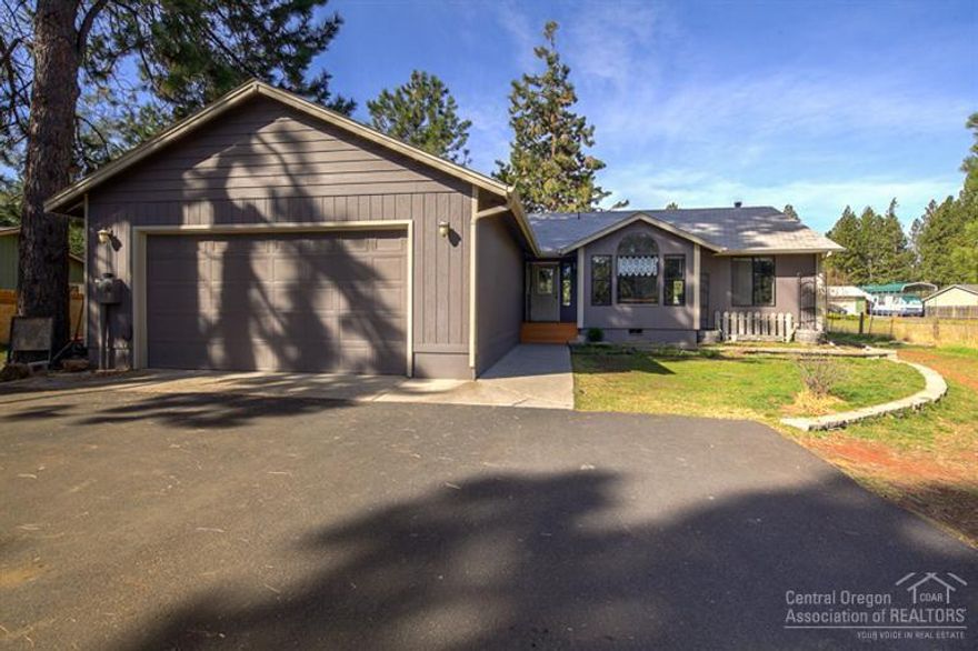 Nearly an acre in SW Bend, horse friendly & NO HOA! Comfortable single level home w/gated entry & paved drive, great for kids & pets. Hardwood floors, tons of windows & new cabinets in kitchen. Spacious Master Suite, ample sized bedrooms, formal dining & breakfast nook. Back deck overlooking pasture/yard for summer fun, outbuildings for storage/tack room. Property is fenced & cross fenced. Plenty of room to build your dream shop & RV & toy storage! Easy access to the Old Mill & hwy.