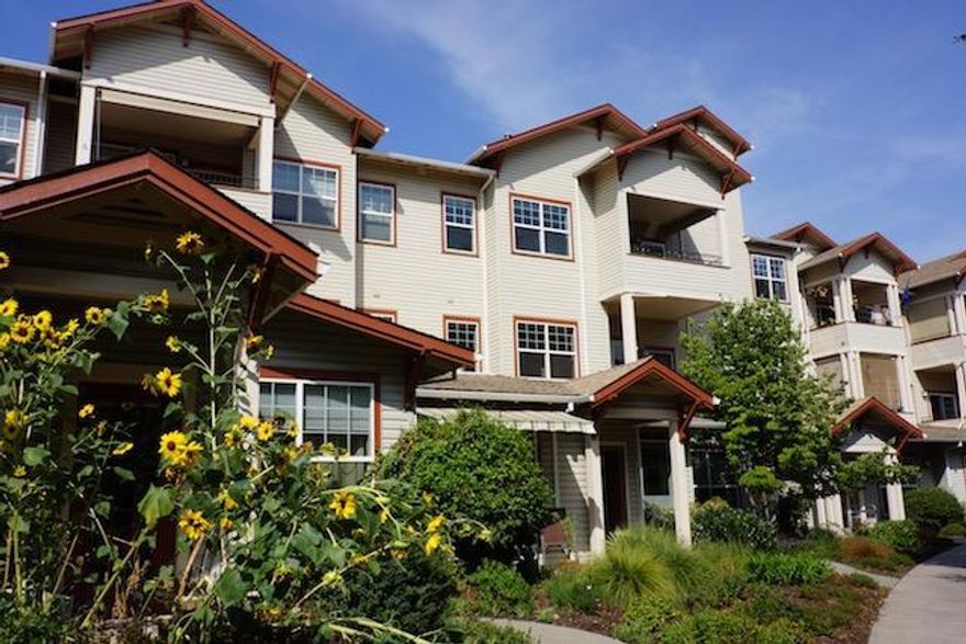 Looking for views of nature? This is the one for you! Wonderful views of year round creek, private park and the hills around Ashland. Take in the splendor of Mt. Ashland from the large covered balcony. Gorgeous brand new laminate wood floors and interior paint!!! Living room and master bedroom are spacious, light and bright. Kitchen has extra space for eating nook. One of the bedrooms is right off the kitchen and has beautiful glass paneled French doors. It makes a great office or study area. Condo shows like new!!! Great location with easy access to Clubhouse through an elevator/skywalk system. Assigned parking and storage too. All this and more at Ashland's premier 55+ community -- Mountain Meadows.