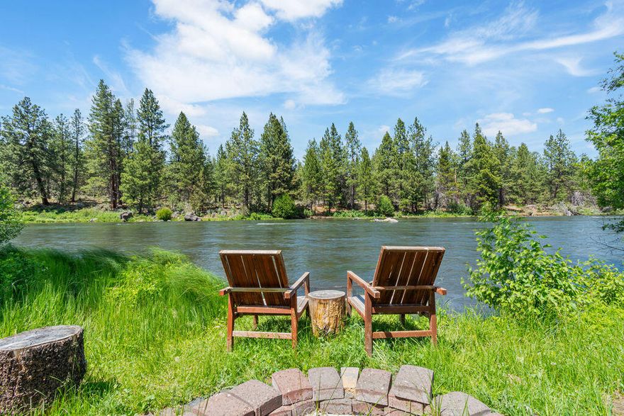 A fantastic opportunity to own this spectacular, unique Riverfront, Scandinavian designed home, just minutes from downtown Bend! Immerse yourself in majestic serenity & breathtaking views from nearly every room! As if the expansive, 4-bedrm, 3.5bath, open floor plan is not enough, the floor-to-ceiling windows & skylights add to the complete ambiance overlooking the 240+ feet of riverfront property. Enjoy the peaceful snowfalls in winter, fishing and wildlife nearly year-round, and take a dip in the river to paddleboard or cool off in the summer.  Drinks & s'mores around the fire pit will surely be the cherry on top! Previous owners remodeled this home in 2017. The current owners have painted house/garage, added new decking, a new dual zoned HVAC system, replaced 6 windows and a skylight, new refrigerator, new Bosch dishwasher, Nest app thermostat, removed dead trees to create defensible fire space, heated driveway. VRBO/STR possible. Opportunities like this rarely come along.