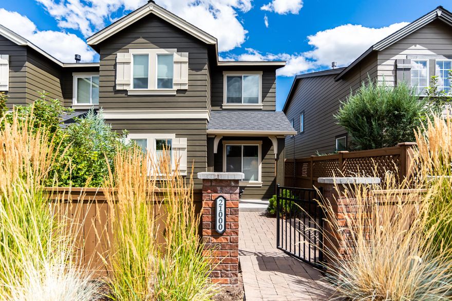 This charming end unit townhouse is located in the heart of NE Bend. Easy living with an adorable courtyard in front, a flat driveway in back and a two car garage. Special features include, granite, tile and plank flooring. Cute fireplace in the living room, air conditioning and nice blinds throughout. Upstairs features include a nice sized bonus room with two skylights, laundry three bedrooms, two linen closets and a walk in closet. One owner.