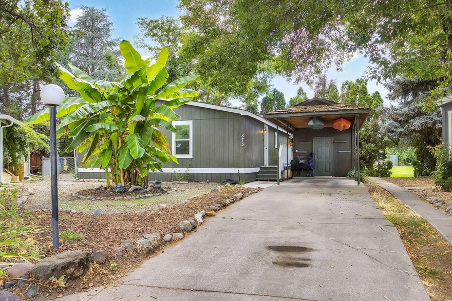 Welcome to Myra Lynne Estates, a family friendly park with beautifully maintained grounds, pool, park, playground, tennis courts and a community club house with pool tables & event/game area w/kitchen for the Park residents to enjoy. This well maintained 3 bed/2.0 bath home with 1,080 sf and a split floor plan that includes: vaulted ceilings, spacious living room, dining area, a large open kitchen with lots of counter space & cabinets too. This home has been completely updated inside with new drywall, new wood flooring, new hardwood kitchen cabinets and solid surface counter tops, new water heater, new plumbing and lighting fixtures & new Pex plumbing thru-out.  New interior doors & closet organizers. Newer appliances, ceiling fans, updated primary and guest bathrooms with new showers, vanities, toilets and much more. From the outside you will find a covered front entry porch with a finished 9'x 11' enclosed bonus/hobby room or possible office area & 2 car detached carport w/Stg-Shed.