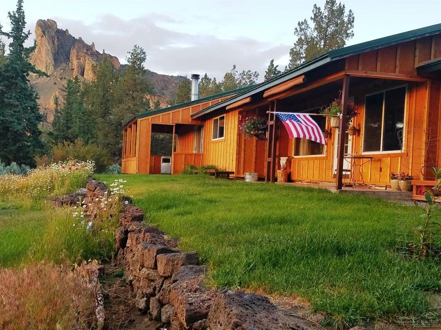 Look at this Location! Knock your socks off Smith Rock Views!3 bedroom home w/updated kitchen w/granite counter,hickory cabinets & tile floors. Lg 500Sqft vaulted master w/pellet stove & doors to outside patio. Situated on 4.81 Acres w/3.5 acres of Irrigation this property has a 4 stall 36x36 barn along with a 240 Sqft detached building with Electric that could be made into studio as Water and Septic are stubbed out.This property has Tons of Potential and Possibilities and Breath Taking views Must See!