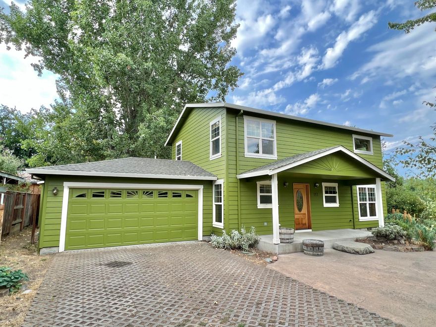 Looking for that tucked away treasure yet close to everything? This is your home. Built in 2002 by Suncrest Homes, this 3 bedroom 2.5 bathroom home is situated on one of the largest lots in this subdivision. .22 of an acre, backing to a private wetlands area this home offers privacy and convenience all in one. Garden to your hearts delight or just minutes from town, this home has so much to offer. Newly refinished oak hardwood floors inside, delightful fresh paint outside, new, energy efficient heating/cooling system, there's so much to love here. Come see for yourself with an easy appointment