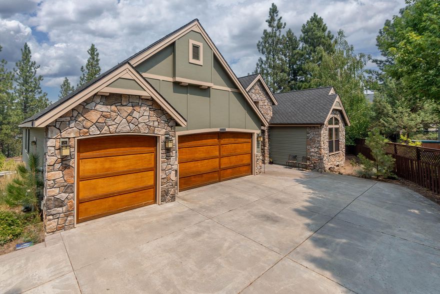 Riverfront retreat in River Canyon Estates! Stunning single-level with 3 bed, 2.5 ba, w/office & bonus room! Large .35-acre lot, with the sounds of the Deschutes River below. Hardwood floors & extensive wood finishes add timeless elegance. Grand great room w/vaulted ceilings & large picture windows framing views of the surrounding nature. Gourmet kitchen is complete with granite counters, SS appliances, island/breakfast bar, and breakfast nook. The oversized primary suite features separate sitting area and primary bathroom with soaker tub, tiled shower, double vanities, and walk-in closet. The guest bedrooms are connected by a Jack and Jill guest bathroom for added convenience. Separate office/den, as well as large bonus room/flex space.  Expansive covered back deck, with beautiful built-in stone fireplace for year-round enjoyment. HOA includes access to clubhouse, tennis court, & swimming pool. Convenient location just minutes from town, the old mill district, shopping & schools.