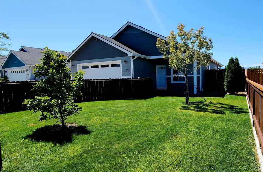 This beautifully maintained 3 bed, 2 bath home on .15 acres in White City looks like new construction! Features include an open great room with vaulted ceilings, granite counters, large island with sink and seating, and a gas stove (never used, per seller). Enjoy a covered patio off the dining area, lush grass with gravel on both sides of the home. The front yard is fully fenced and gated for privacy. Home may be sold fully furnished with a strong offer. Don't miss this move-in ready gem—call today to schedule your showing.