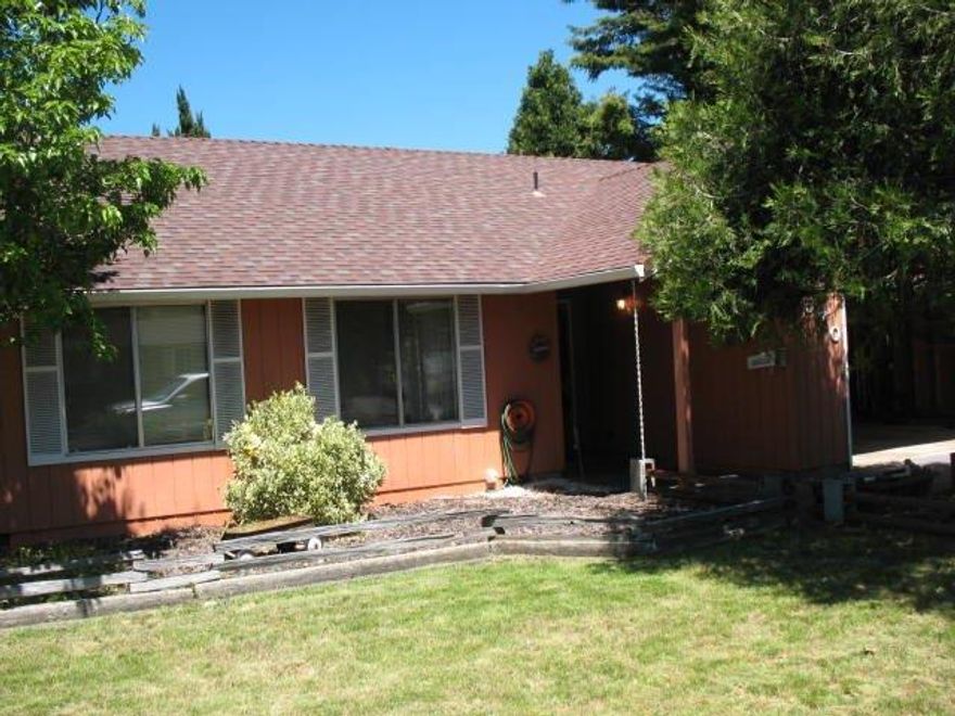 Southwest Medford home close to all city services with vaulted ceilings, kitchen opens into living room with a cozy brick fireplace. Patio off slider off the dining area for easy access to the back yard. Adorable garden shed in the very private fenced back yard with mature landscaping with a manual sprinkler system in the back yard only. Lots of room for raised garden beds. Large RV parking.
