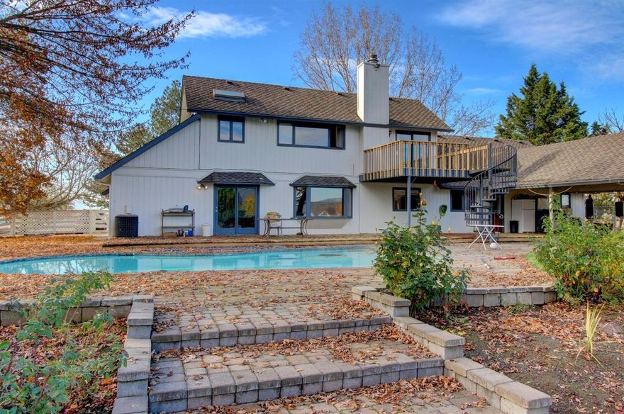 Owner Carry Option Possible (with Seller Approval) * Zoned EFU * One of a Kind Property and Location * Spectacular Home with So Much Potential, Irrigated, Flat, Zoned EFU, In-Ground Swimming Pool, Fenced andCross-Fenced perfect for animals, 39.9 Irrigated Acres, Incredible Huge Barn/Shop, So Much More! Pass through the grand gated entry into this 41+ acre property complete with a large barn, gorgeous in-ground pool and covered patio for entertaining, and nice private deck off of the Master suite. Perfect for crops, cows, horses, animals, etc.