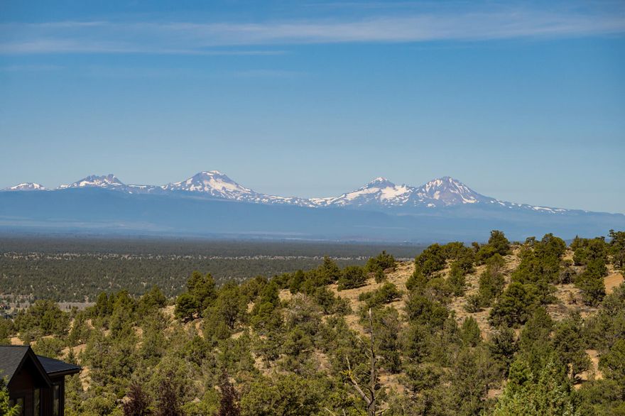 This exceptional view lot offers panoramic views of the majestic Cascade Mountains, providing a breathtaking backdrop for your future home. The property backs to a common area ensuring privacy and an open spacious feel.  With no immediate rear neighbors, you'll enjoy uninterrupted views of the Butte and the tranquility of nature right from your backyard.