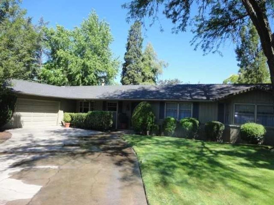 This Ranch house offers a uniquely American style of architecture with a single level spacious floor plan and plenty of glass to link the interior with the beautiful extensive landscaping and grounds. The house style fuses modernist ideas and styles with wide open spaces to create a very informal, casual living and entertaining style. This custom built home offers more dramatic features like varying roof lines, cathedral ceilings, sunken living room, beautiful hardwood floors, MBR suite and brick and wood exterior. In the interior, the home is open and airy. The living and dining areas blend into one another and the kitchen is adjacent to the family room. French doors seamlessly open to the outdoors, where you will also find a back covered deck & Patio.