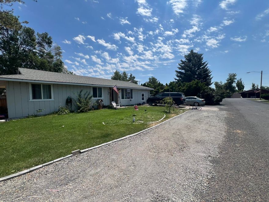 This home is in a wonderful sleepy little farm town perfect for getting away from the noise of town! With three bedrooms and two full bathrooms there is plenty of room for everyone! There are two bonus rooms, one currently being used for an office and another room the could be whatever your heart desires! The backyard has a green house, chicken coop, storage shed, and a dog run. There are wonderful shade trees, blueberry, blackberry, and raspberry bushes in the backyard as well! One of the owners is an Oregon licensed real estate agent.