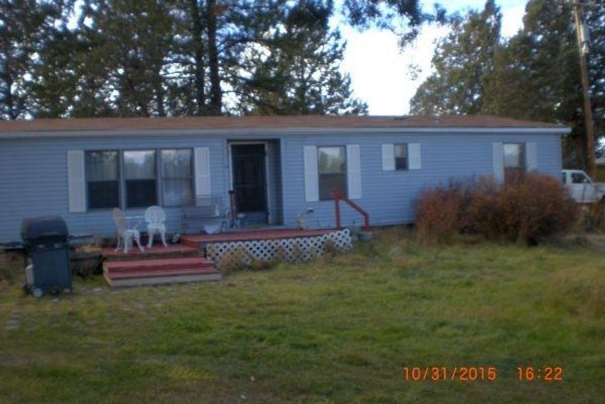 Wow! Manufactured Home On 22+ Acres With Seasonal Pond. New Interior Paint And Floors In Kitchen And Dining Room. Lots Of Room To Move Around. Pasture Land With Trees For Shade. Spacious Barn For Animals And Storage. Comes With Two Wells.