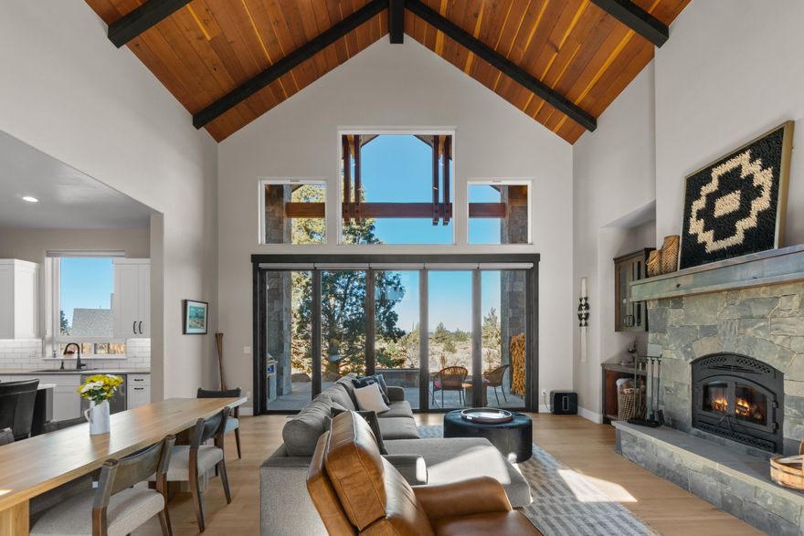 Stunning custom home in Brasada's Westside. This 2375 s/f home plus 716 s/f ADU separates itself from all the others being clad in solid reclaimed Redwood & with the wonderful Transitional Design. The home centers around a paramount view of Mt. Jefferson and pastoral views of the high desert, as well as the remarkable custom stone wood-burning fireplace. The great room has a soaring T&G ceiling and an abundance of large windows. Kitchen is complete with a huge center island and everything a chef could dream of. Lots of room to stretch out with friends and family with the main level 4 bedrooms / 2.5 baths & a gracious separate 1/1 apartment above the garage. Enjoy outdoor living year around on the covered patio.  This home looks and feels brand new, has wonderful ADA compatibility, + a 1000 sf 3-car garage w/ EV charger. Create your own enduring Central Oregon sanctuary. From sunrise to sunset the beauty of this home and its surroundings will captivate your heart