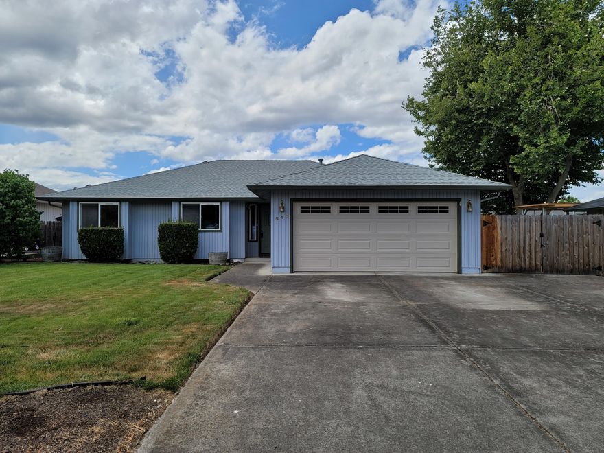 Turn key home will NOT last long!!! This open floorplan boast 3 bed/ 2 full baths at 1,232 Sf. Trey/ vaulted ceilings in living room and master bedroom. Master has a sizeable walk in closet as well as double sink vanity. This home has an abundance of natural lighting w/ very spacious front & back yard including planter boxes, RV parking & newer roof! Double car garage has built in shelving & work bench for all storage and project needs. Close to shopping & restaurants!