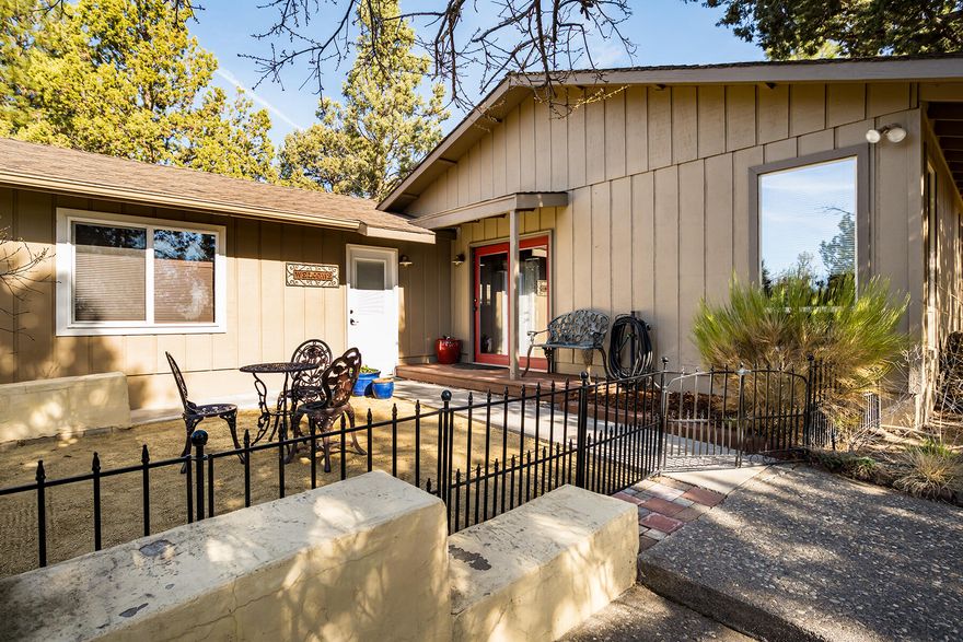 This hobby farm in Tumalo offers everything for the small livestock/gardener enthusiasts! Featuring 3 bedrooms and 3 bathrooms, this one-story home has a newly updated kitchen and fully insulated 2 car garage with lots of storage. The two separate living areas offer a wood stove and a pellet stove to keep you warm. Outside you will want to wander through the paths that take you from a serene fire pit/sitting area to a beautiful shed to the fully fenced garden with a green house then to the chicken coup and the field adjacent. Located only minutes to downtown Tumalo and the Deschutes River.