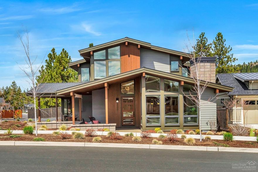 Beautiful, light & bright, south facing Mid-Century Modern NorthWest Crossing home offers an open great room floor plan with plank hardwood flooring in main living areas, expansive vaulted ceilings, custom built-ins, gas fireplace with floor to ceiling tile surround. Spacious kitchen features a large island, slab quartz counter tops, custom cabinetry, pantry and professional-series appliances. Access off the dining area to a comfortable covered outdoor living space. Large windows offer abundant natural light through out. In-ceiling speakers run throughout most of the home and patio. Extensive built-ins & generous storage spaces. Master & guest room on the main level, 2 additional bedrooms, bathroom and a large bonus room with vaulted ceilings upstairs. Coveted, oversized 3-car garage with alley access. Low maintenance landscaping & fenced back yard. Built by Structure Development NW.<br>