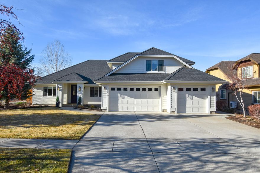 Sought-after ADU opportunity in Bend! This beautifully maintained home sits on a spacious .23 acre corner lot. The 2,236± sq ft single-level main home features 3 bedrooms, 2.5 bathrooms, and a dedicated office (or 4th bedroom). The bright great room showcases vaulted ceilings, vinyl plank flooring, and a gas fireplace. The updated kitchen includes stainless appliances, concrete countertops, pantry, freshly painted cabinetry, and a dining nook with built-in banquette seating. Above the 3-car garage is a 498± sq ft ADU with a private entrance, full bathroom, and kitchenette, ideal for rental income or guests and is currently rented for $1,375 per month, providing immediate rental income. The fully fenced backyard offers a large patio, raised garden beds, and mature landscaping, perfect for outdoor living. No HOA. Recent updates include interior and exterior paint and flooring (2022), new roof (2023), and a remodeled bathroom and fencing (2025). A rare Bend ADU opportunity & a must see!
