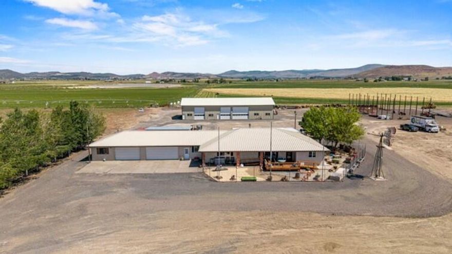 Farm - Home - Shop 
184 acre farm located minutes from Klamath Falls.  Built in 1984, this home is 2200sf and has 3 bedrooms & 3 ½ baths.  Features include; large kitchen, split floor plan, counter seating, rec room/flex space, mud room w/shower & toilet, F/A heat & AC, Monitor heater, woodstove, (2) 1-car garages, heated, w/workshop. Outside is a partially covered front deck, fenced area w/raised container beds and nice landscaping. 23'x45' covered parking area in back and a great hobby shed w/power, hot/cold water & finished interior.  The huge 5000 sf shop has a cement floor, power & water.  Includes office space, parts room, plumbed bathroom, loft storage, airline throughout, 4 roll-up doors & more.182 pivot irrigated acres primarily in the KBID & Midland Irrigation Districts. 3 Parcels.  Owners wish to sell all together,however there may be partition opportunities for the new buyer. Not enough space here to cover it all. Grain planted Fall 2025. Home/shed subject to Life Estate.