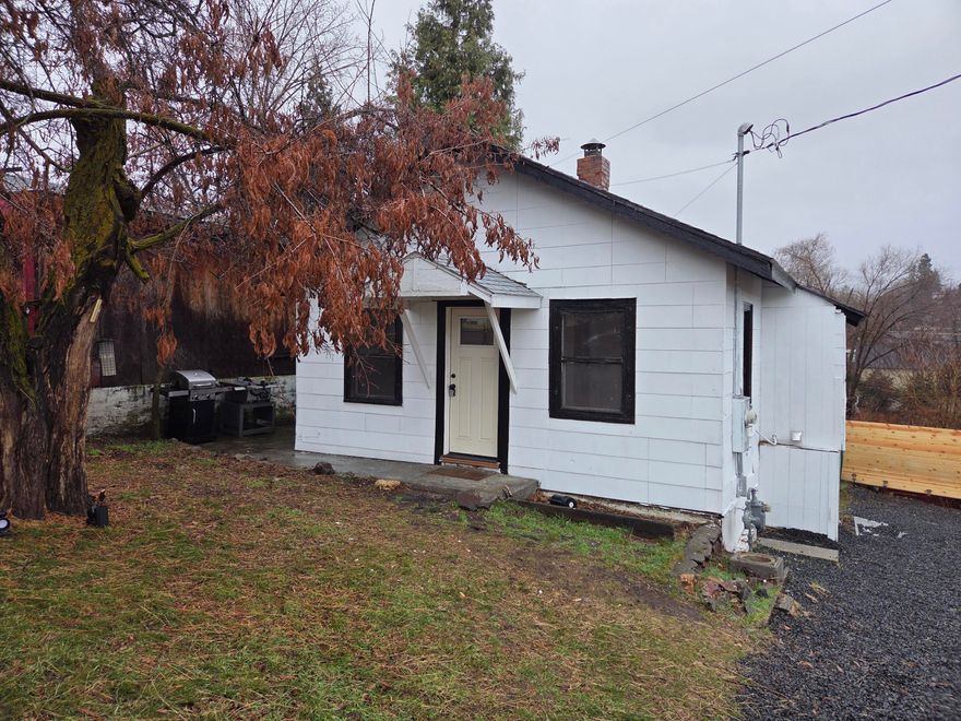 Charming 400 sq ft, 1-bedroom home featuring a freshly painted kitchen, new flooring, and a fully repainted interior completed in 2023. A brand-new front door installed in 2023 adds to the home's fresh appeal. The property also includes a ½ basement and pine fencing, offering added functionality and privacy. Compact and easy to maintain, this home makes a great rental opportunity or efficient living option—all at an affordable price. Don't miss this opportunity—schedule a showing today.