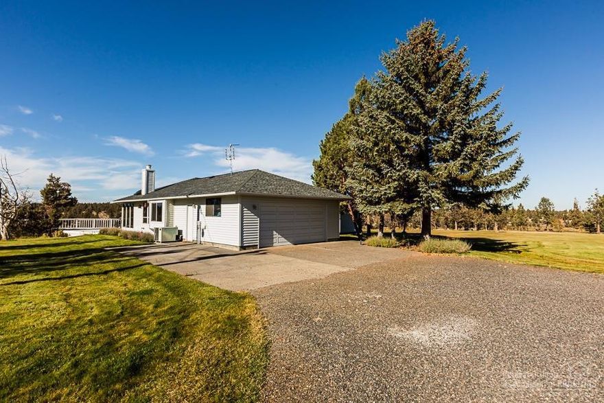 2227 sq ft single level home on 5.36 acres with 2 acres COI irrigation. Barn and Tack Room with stalls for your animals.Home has large vaulted living room with terrific Cascade Views and a warm fireplace. Formal dining, kitchen with tile counter tops and island for extra space opens to Family room and solarium. Master with walk in closet, shower and additional separate room for an office. Great Cascade views. 3 full baths, double car garage and privacy at the end of the lane. What a terrific place!