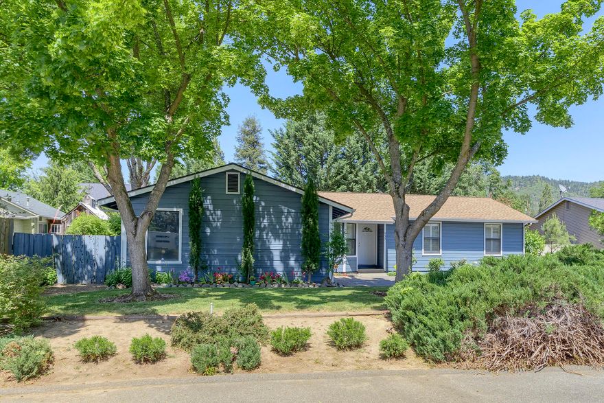 Adorable 3 Bdrm, 2 Bath Cottage located in NE Grants Pass.  Lots of updates including new paint inside and out, new carpet in 2 bedrooms & vinyl flooring in 1 bdrm/office, new mini-splits (heat/ac) in all bedrooms and living room.  Vaulted living room features gas stove, ceiling fan and adjoining dining area.  Kitchen has eat-in breakfast bar along with breakfast nook for dining table.  Large pantry closet offers tons of storage.  Adjoining laundry room.  Two-car attached garage recently drywall/tape.  Roof is approx 10 yrs old.  Foundation is reinforced concrete which allows for future upstairs addition (plans provided).  Covered patio with raised garden beds, deck and side yard.  This home is close to District 7 Schools, shopping and downtown, and move-in ready condition!