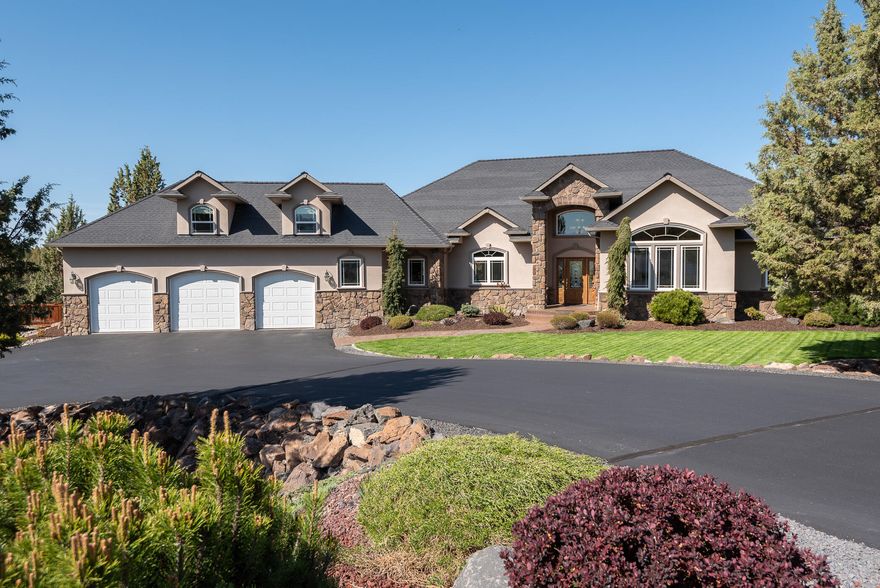 Peace, tranquility and privacy await you in this stunning custom home. Built with attention to detail and beautiful views at the end of a cul-de-sac in Dry Creek Airpark. Gorgeous home with abundant natural light. Chef's kitchen features everything on the most discerning cooks list. Casual and formal dining are perfect for entertaining.  French doors open to a beautiful deck with panoramic views. Great room features vaulted ceilings, fireplace and  incredible windows. Main level of the home features a stunning primary suite with 2 sided fireplace, guest room & den. Additional suite upstairs, with a private balcony. Attached oversized 3 car garage & 40 by 50 ft aircraft hangar w/ office & half bath & 220SF of finished storage. Lovingly landscaped with comfortable outdoor living. Dry Creek Airpark has a private paved 3000Ft x 35Ft airstrip at 3620 elevation w/ pilot controlled lighting. Gated community w/ tennis courts. This could be your piece of paradise!