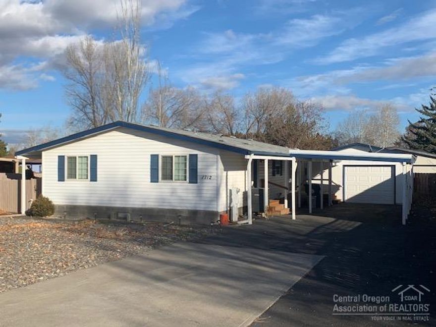 Great affordable family or downsizing home in Central Oregon!! 3 Bedrooms, 2 Baths, vaulted ceilings with updated kitchen and baths, be sure to check out the pics. Don't forget backyard on a cul-de-sac and a single car garage with carport and large driveway. And did I forget to say there is nothing like sitting in a Hot-Tub when it is snowing or using the A/C in the summer. Backyard just needs your LOVE.