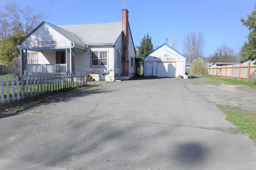 Calling all Investors and Developers.....Great opportunity on this .47 of an acre Zoned R-3 (High Density Residential Zone) with two homes.  Seller has spoken with the city and was told they could put up to 4 duplexes (8 units) on this property.  Buyer to do their own due diligence with the City and/or County. Currently there is a 4-bedroom, 1 bath, 1600 SF home, 2 bedrooms upstairs and 2 downstairs.  Large kitchen, living room, coved ceiling,  wood floors, large porch area with laundry facilities, detached one car garage, and large backyard with a firepit.  RV parking and room for your Big Boyz Toyz.  Studio/guest house has been newly remodeled with new paint inside and out, new light fixtures, all new vinyl plank flooring, bathroom has new countertop and cabinet with sink, kitchen with dishwasher, living room/sleeping area.  Call for your personal tour!