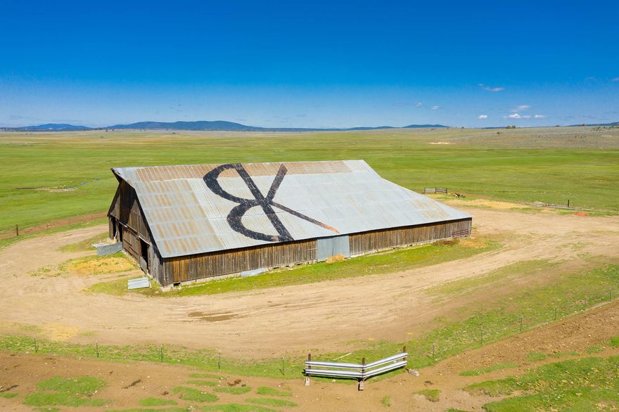 Opportunity to own the Historic BK Ranch; all-deeded, reputation cattle summer pasture, right in the heart of the upper Sprague River Valley. Improvements include a 5-bedroom, 4-bath ranch home, additional housing, a full set of cattle handling facilities and ample hay storage. 2,201+/- acres water rights from the North & South Forks Sprague River, Boulder, Deming, Fritz Creeks and a well. Private 50+/- acre reservoir. Two center pivots and balance flood irrigated. Additional 539+/- acres of dry pasture includes some sub-irrigated areas. Can manage as summer pasture ranch, year-around operation, or combination. Just one mile to National Forest. Qualifies for 4 LOP tags (Buyer to verify with ODFW).