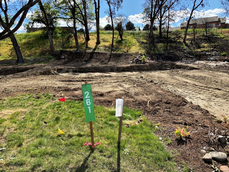 This .16 acre lot is located in a desirable 55+ neighborhood in Talent.  Wonderful location with hillside behind lot.  It's a great opportunity to bring your own builder & construction plans & take advantage of this affordable opportunity. This residential lot is being sold as-is & buyer encouraged to do their own due diligence. Previous home on lot was 1725 SQFT, and was lost in the Almeda fire.