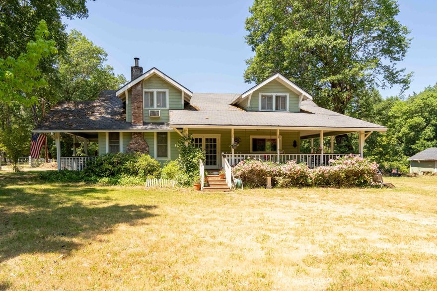 MOTIVATED SELLER PRICE REDUCTION!! Must sell due to relocation. This historic Griffin Homestead is just a 5-minute walk from Griffin Park, the Rogue River, and miles of BLM WALKING AND HORSE-RIDING TRAILS. It's ideal for 3-4 horses, featuring a barn, two run-in shelters, and hay storage. The property includes 2 acres of fully fenced pasture (with quality electro braid fencing).
The charming farmhouse, built in 1906, boasts a wrap-around porch and is move-in ready. A few cosmetic updates will yield significant returns. This is a fantastic investment in a highly desirable area. Bring us your offer.